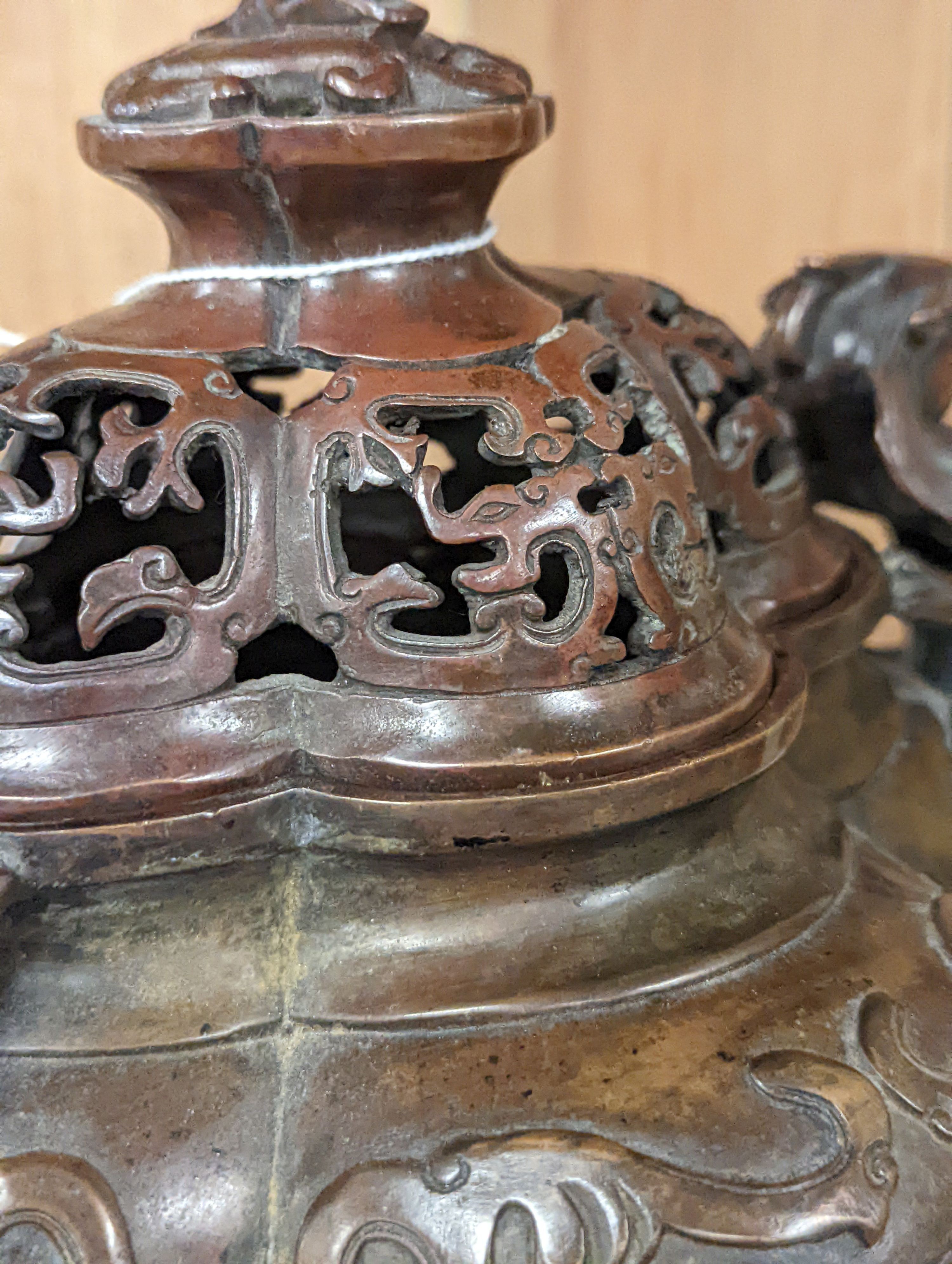 A 19th century Chinese bronze quatrefoil censer, with four character mark - 19cm high